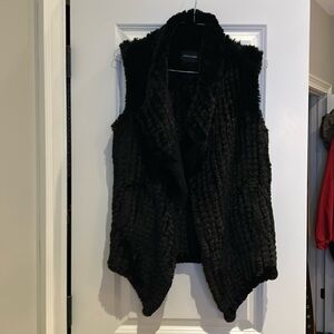 Dolce Cabo black vest, faux fur size medium pockets  so soft, comfortable cozy